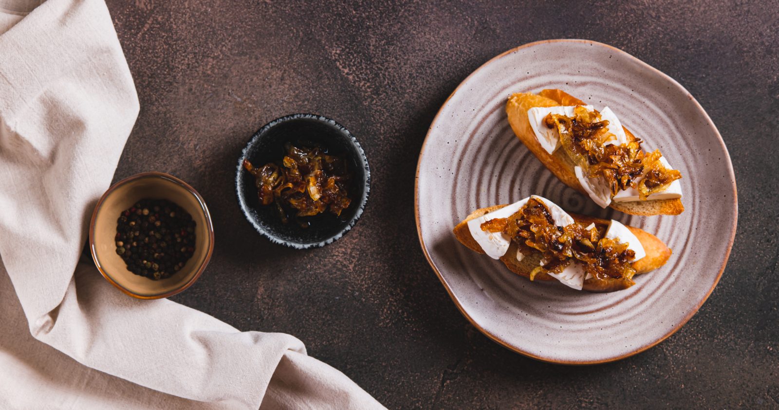 Crostini with Caramelized Onions and Pine Nuts — prepared dish